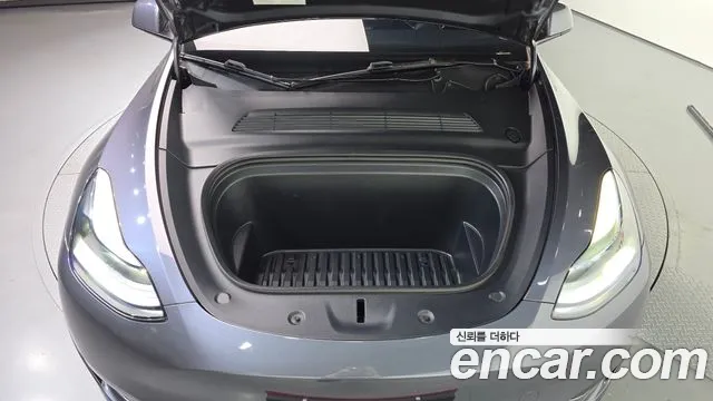 Tesla Model Y — Фото автомобиля 6
