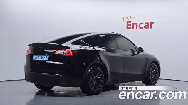 Tesla Model Y — Фото автомобиля 2