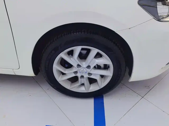 Nissan Tiida — Фото автомобиля 6
