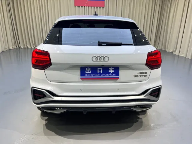 Audi Q2L — Фото автомобиля 5