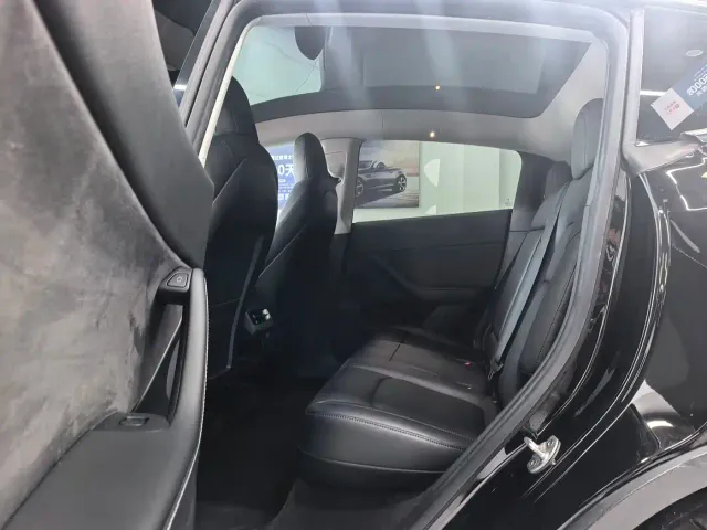 Tesla Model Y — Фото автомобиля 14
