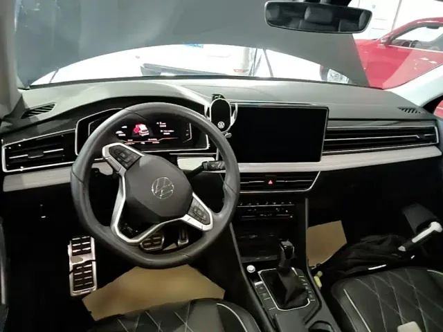 Volkswagen Tiguan L — Фото автомобиля 9