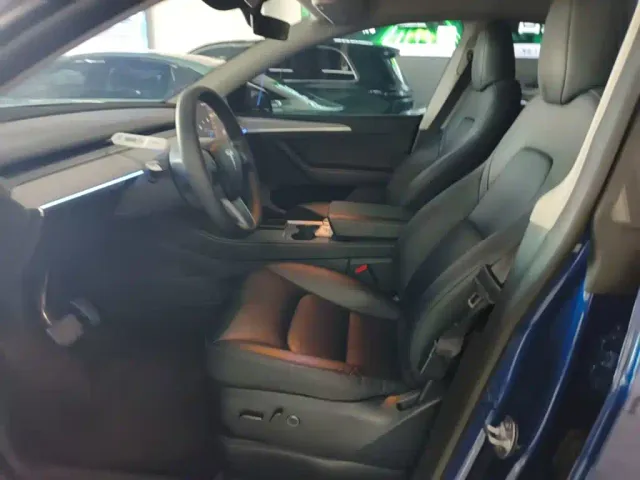 Tesla Model Y — Фото автомобиля 14