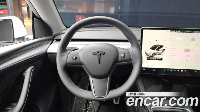 Tesla Model Y — Фото автомобиля 19