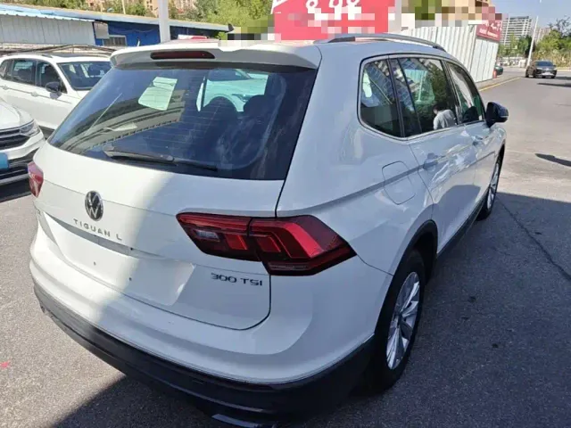 Volkswagen Tiguan L — Фото автомобиля 6