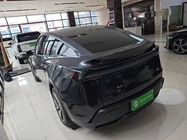 Tesla Model Y — Фото автомобиля 4