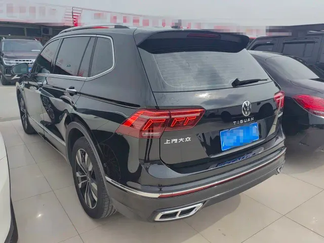 Volkswagen Tiguan L — Фото автомобиля 11
