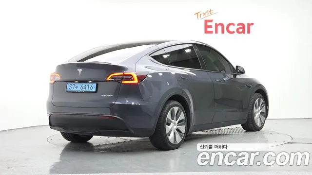 Tesla Model Y — Фото автомобиля 2