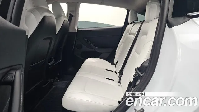 Tesla Model Y — Фото автомобиля 25