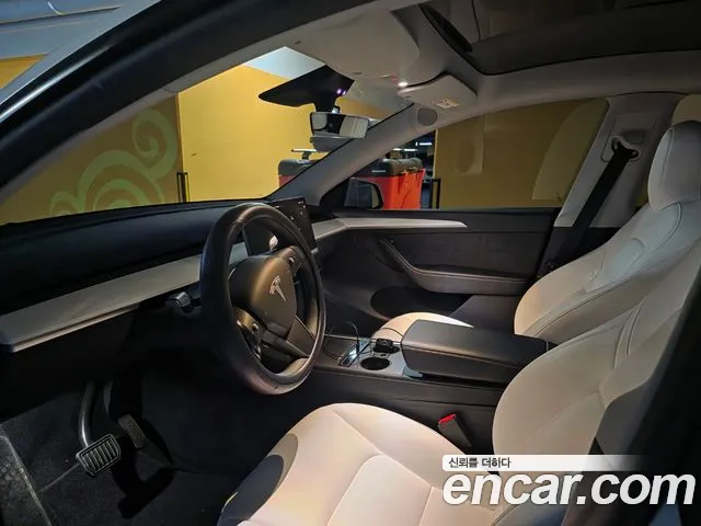 Tesla Model Y — Фото автомобиля 10