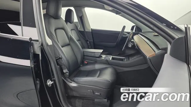 Tesla Model Y — Фото автомобиля 12