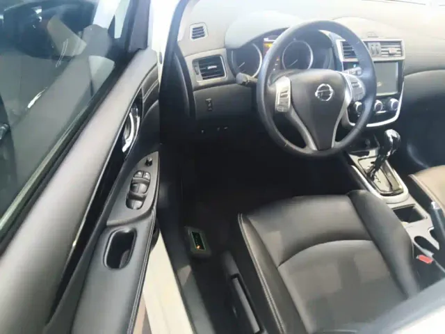 Nissan Tiida — Фото автомобиля 15