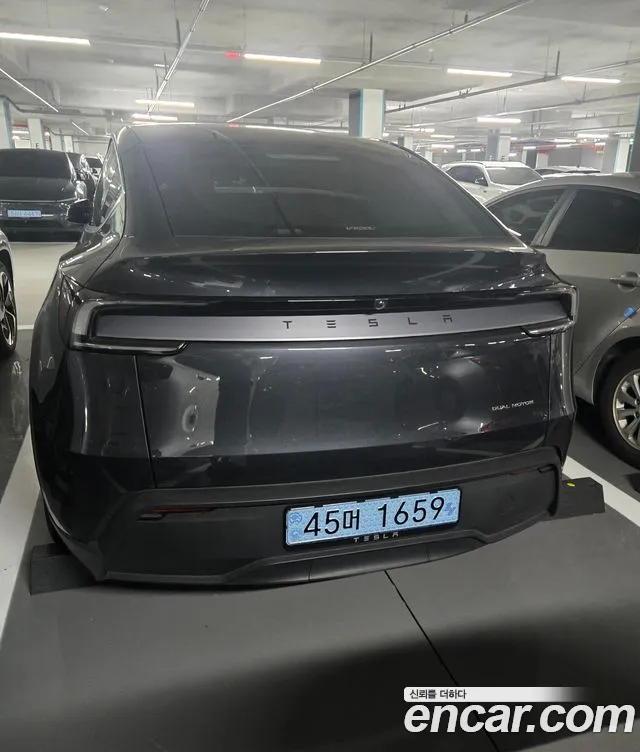 Tesla Model Y — Фото автомобиля 4