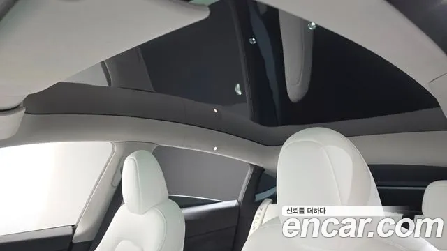 Tesla Model Y — Фото автомобиля 22