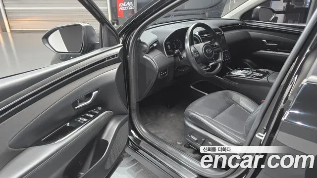 Hyundai Tucson Tucson (NX4) Бензин 1.6 Turbo 4WD — Фото автомобиля 11
