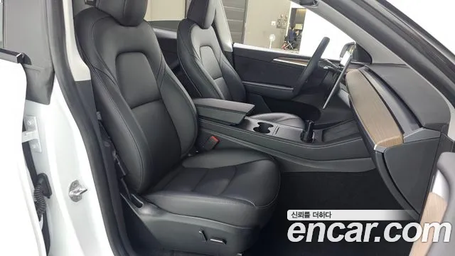 Tesla Model Y — Фото автомобиля 8
