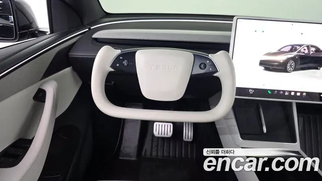 Tesla Model Y — Фото автомобиля 12