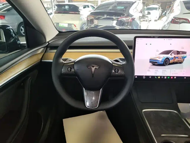 Tesla Model Y — Фото автомобиля 10