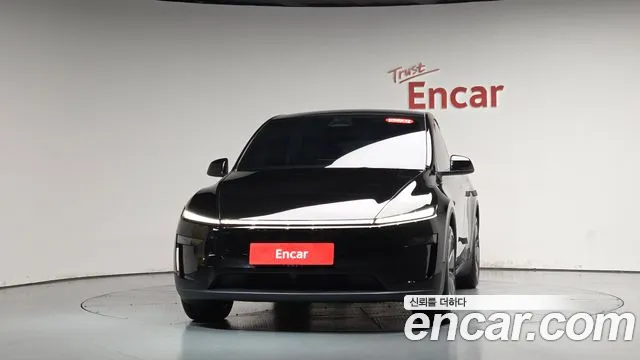 Tesla Model Y — Фото автомобиля 2