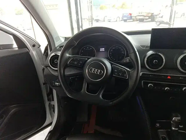 Audi Q2L — Фото автомобиля 10
