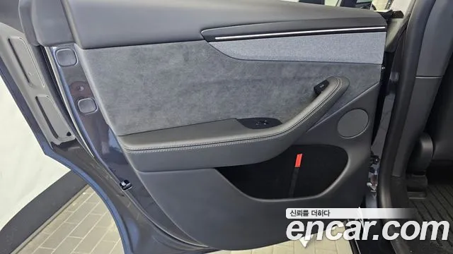 Tesla Model Y — Фото автомобиля 6
