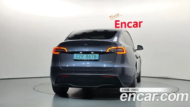 Tesla Model Y — Фото автомобиля 4