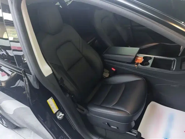Tesla Model Y — Фото автомобиля 18
