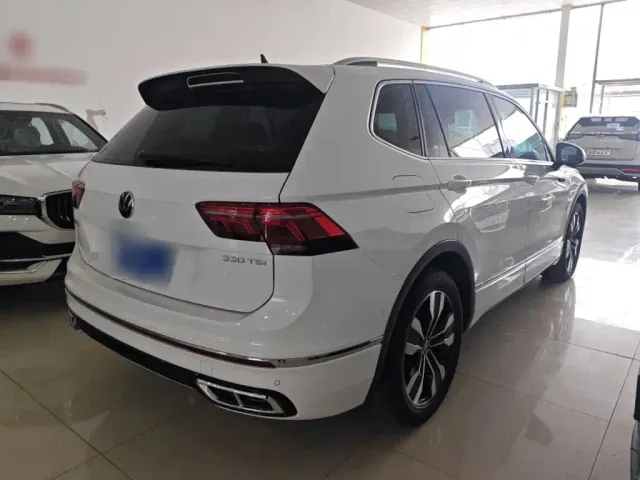 Volkswagen Tiguan L — Фото автомобиля 4