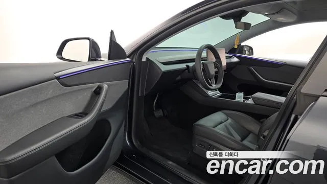 Tesla Model Y — Фото автомобиля 10