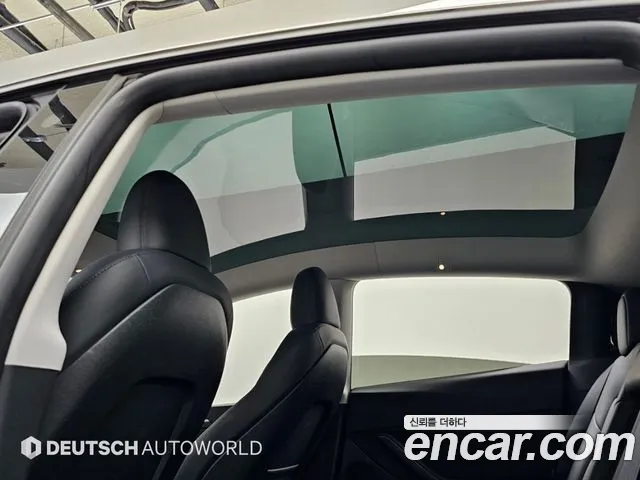 Tesla Model Y — Фото автомобиля 18