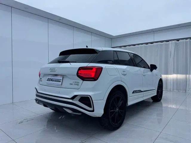 Audi Q2L — Фото автомобиля 6