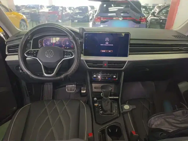 Volkswagen Tiguan L — Фото автомобиля 9