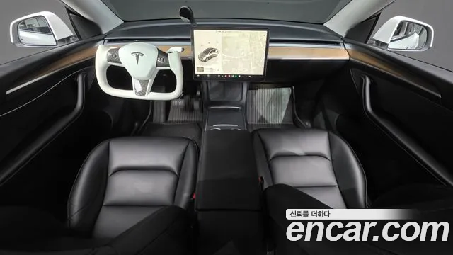Tesla Model Y — Фото автомобиля 10