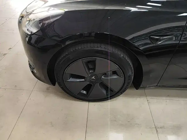 Tesla Model 3 — Фото автомобиля 22