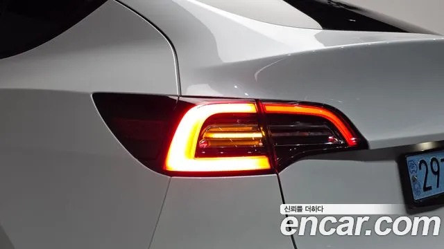 Tesla Model Y — Фото автомобиля 7