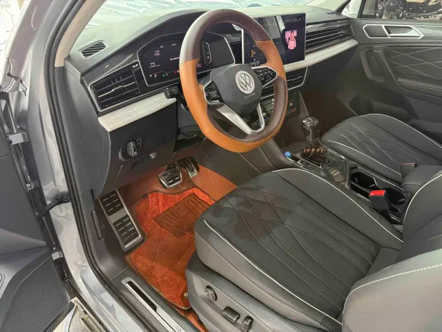 Volkswagen Tiguan L — Фото автомобиля 8