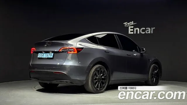 Tesla Model Y — Фото автомобиля 2