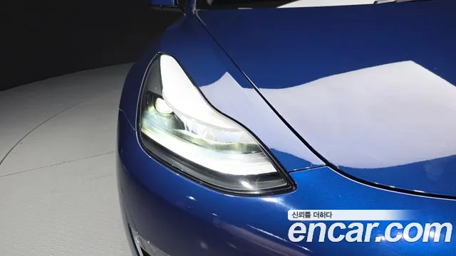 Tesla Model 3 — Фото автомобиля 14
