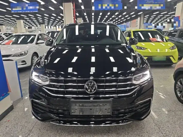 Volkswagen Tiguan L — Фото автомобиля 2