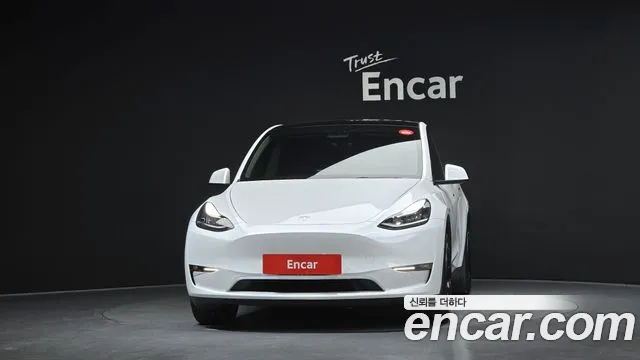 Tesla Model Y — Фото автомобиля 3