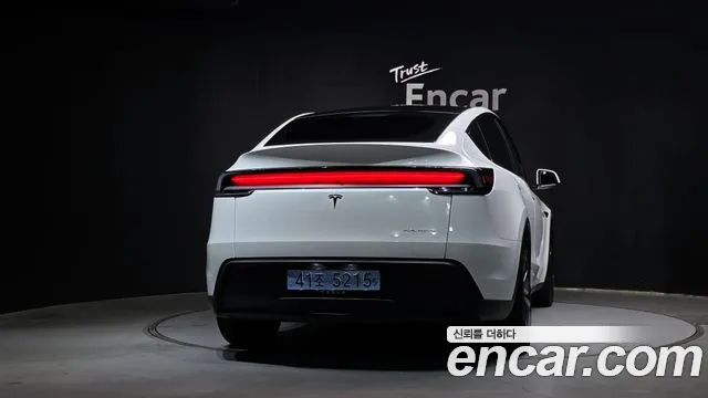 Tesla Model Y — Фото автомобиля 4