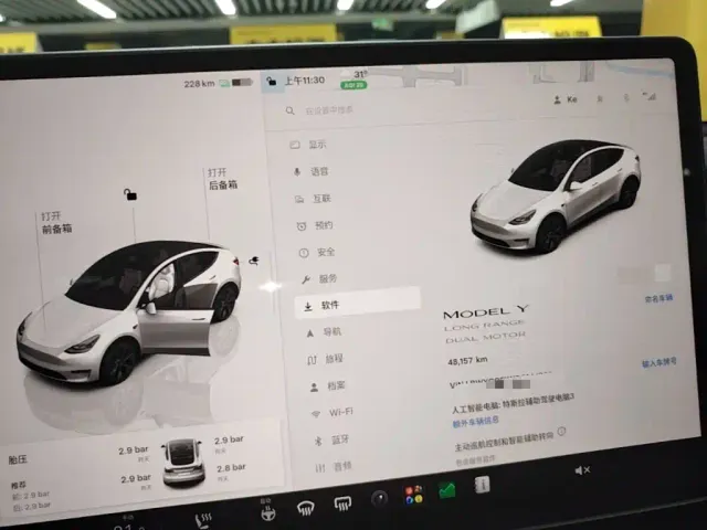 Tesla Model Y — Фото автомобиля 11