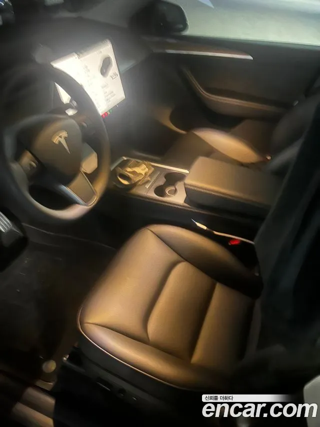 Tesla Model Y — Фото автомобиля 11