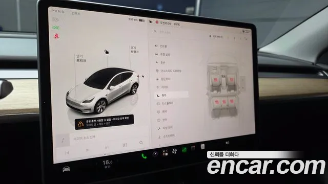 Tesla Model Y — Фото автомобиля 16