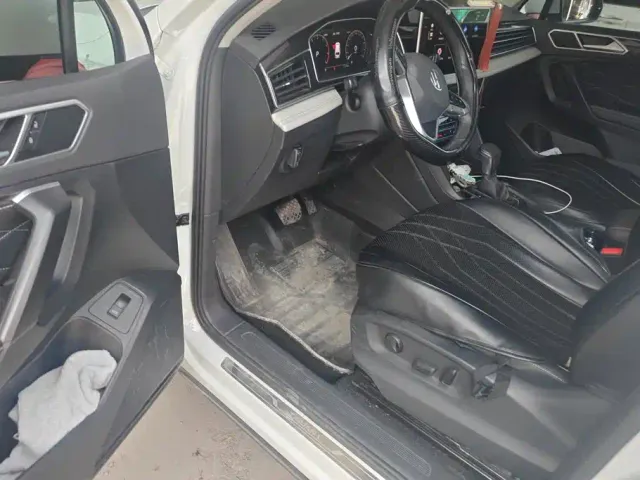 Volkswagen Tiguan L — Фото автомобиля 9