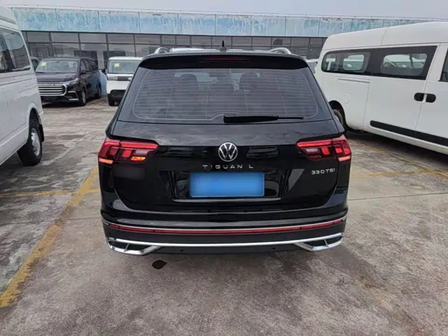 Volkswagen Tiguan L — Фото автомобиля 5