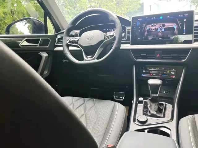 Volkswagen Tiguan L — Фото автомобиля 14