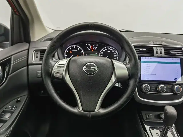 Nissan Tiida — Фото автомобиля 11