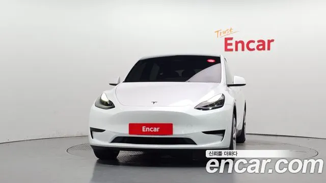 Tesla Model Y — Фото автомобиля 3