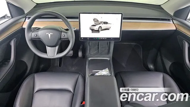 Tesla Model Y — Фото автомобиля 9